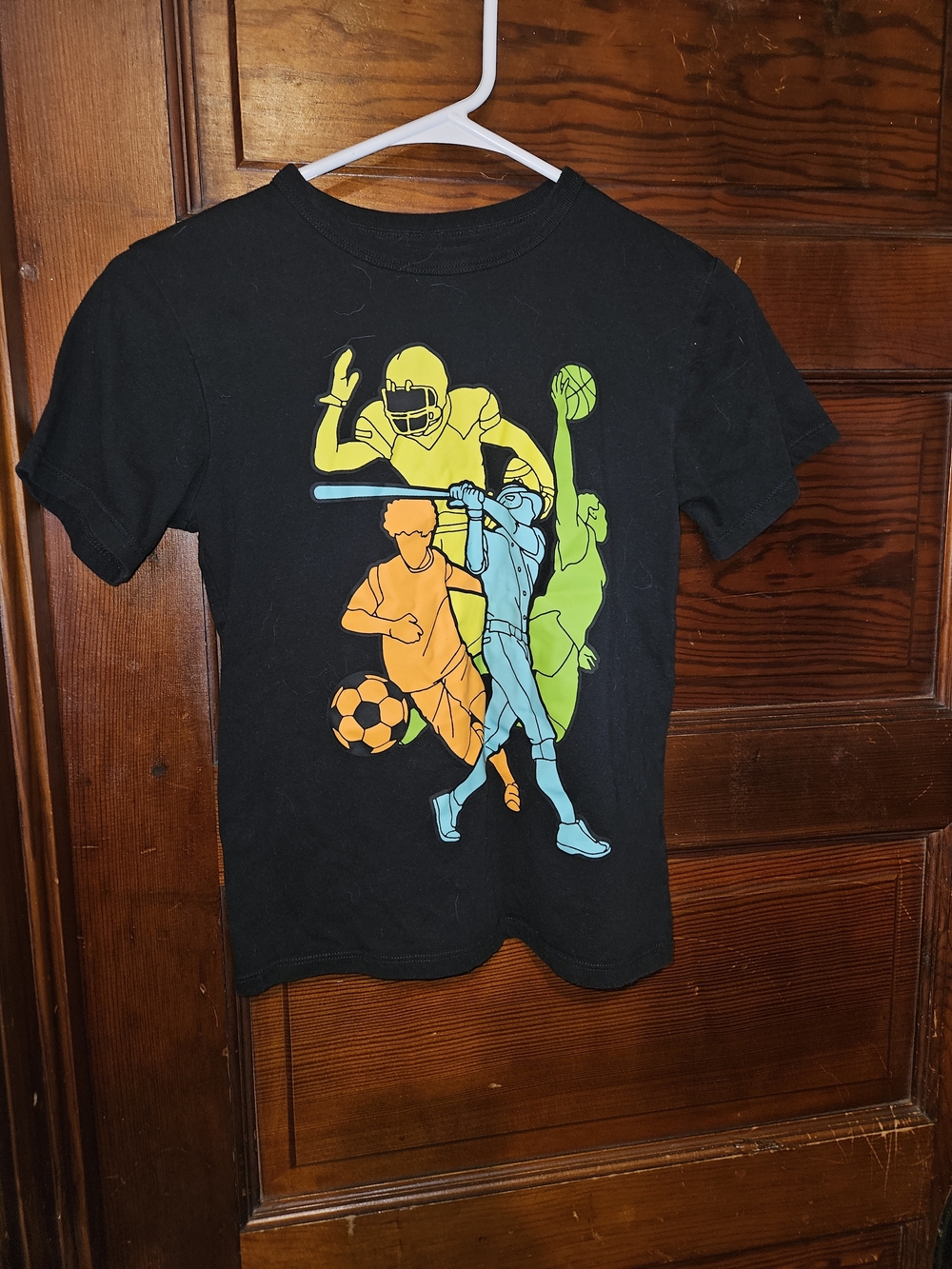 Place Black Tee with Yellow, Blue, Green & Orange Sports Silhouettes